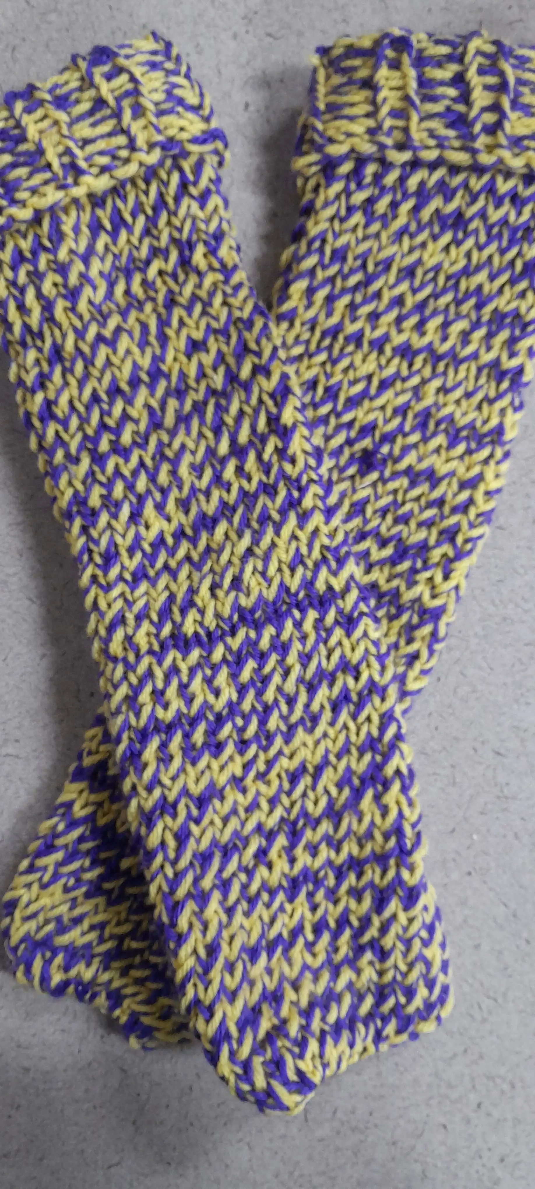 Hand-knit slipper socks with a cozy textured pattern